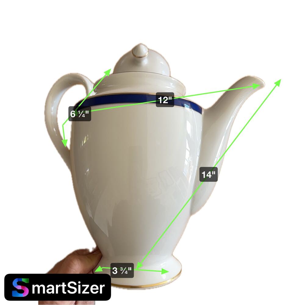 Tiffany & Co Teapot and creamer.  Like new.  Never used.  Only on display